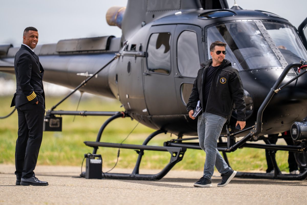 Kevin LaRosa II walking away from a helicopter on the ramp