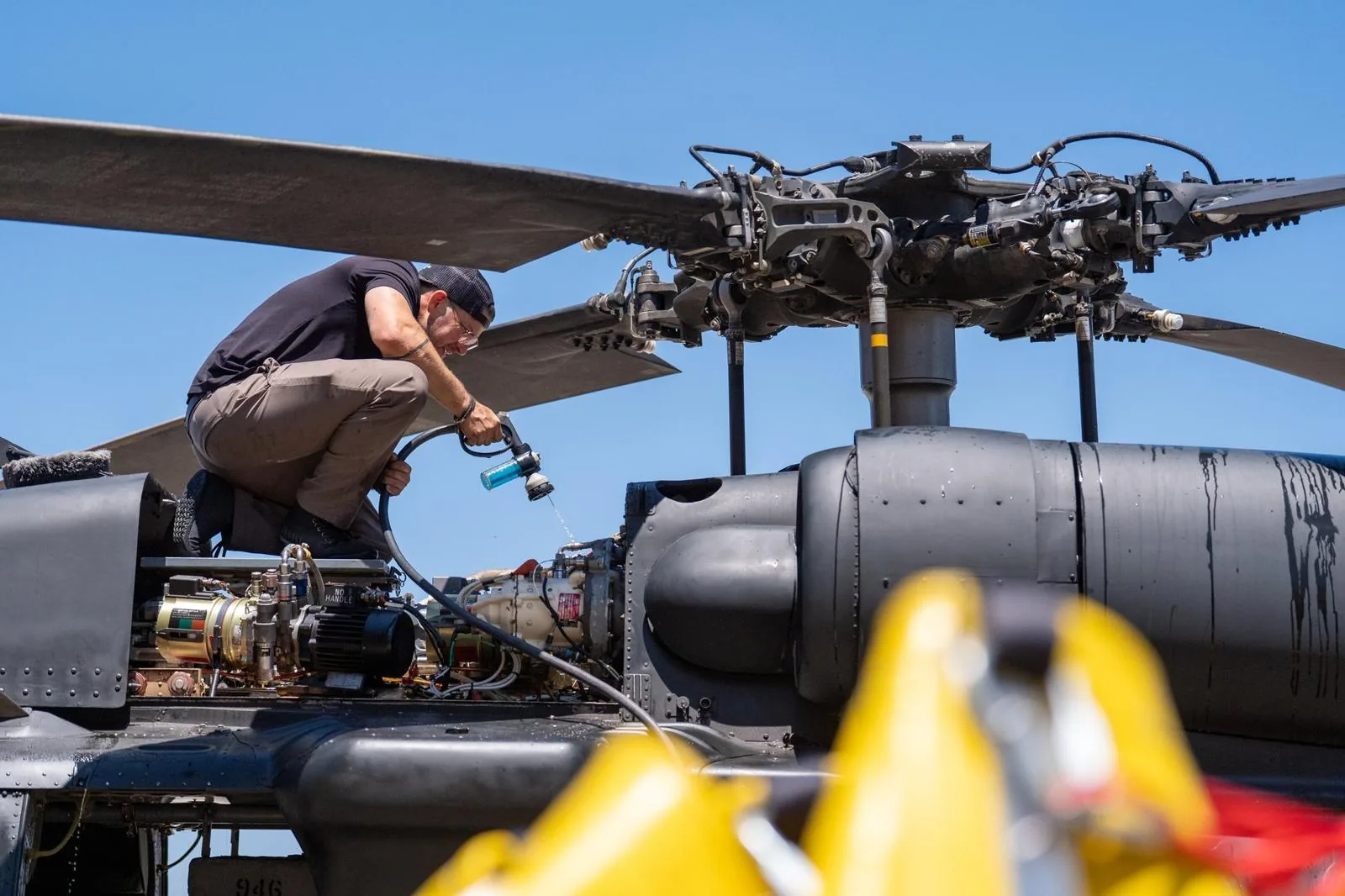 Working at the rotor head of a Black Hawk