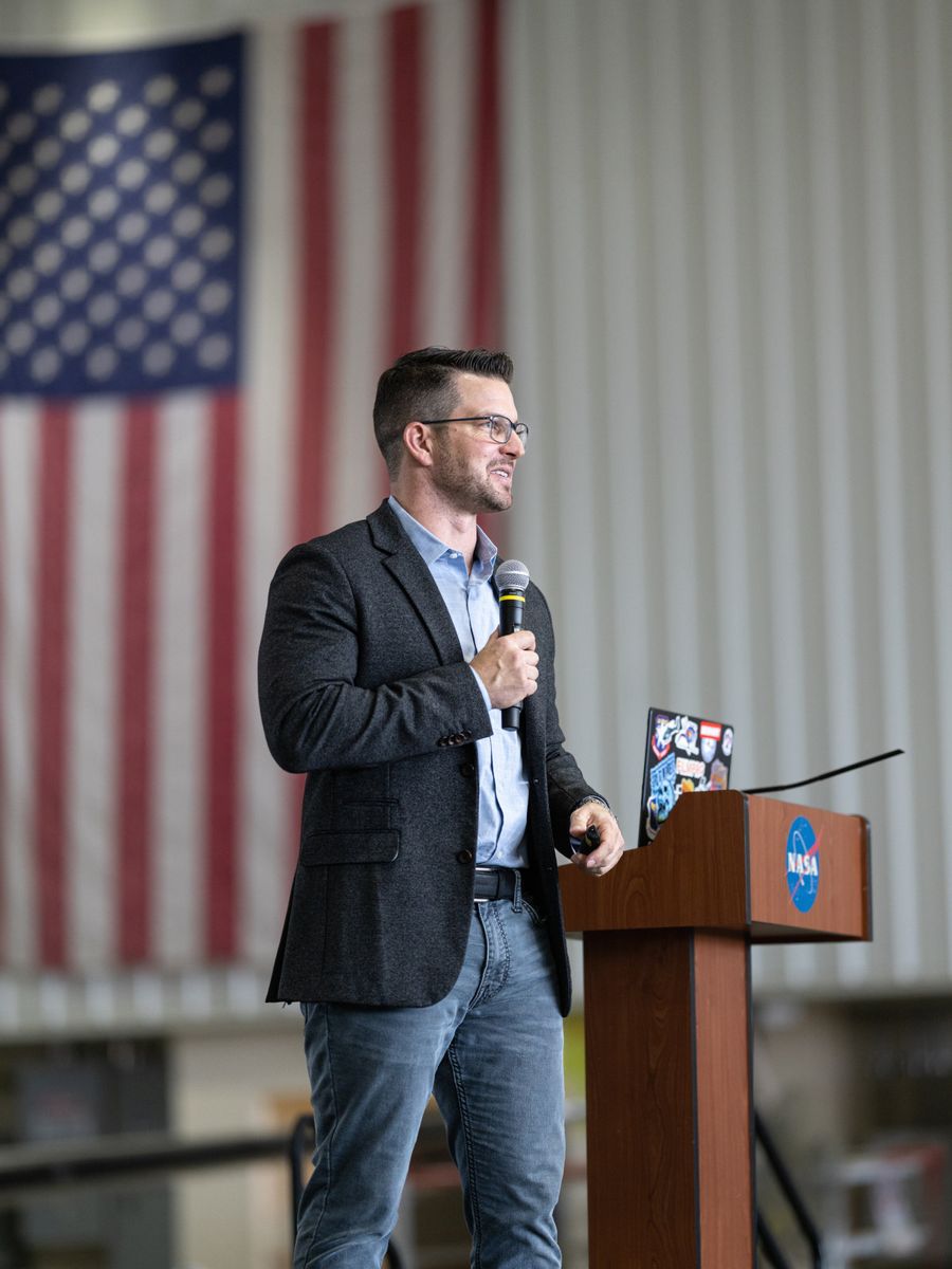Speaking at a podium