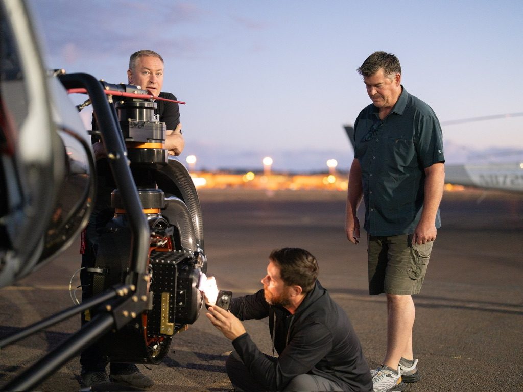 Preparing a camera helicopter at dusk
