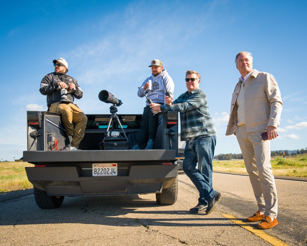 Crew with a camera vehicle on location