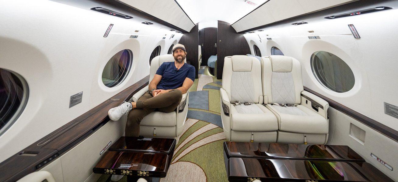 Jordan Orsak in a private jet cabin