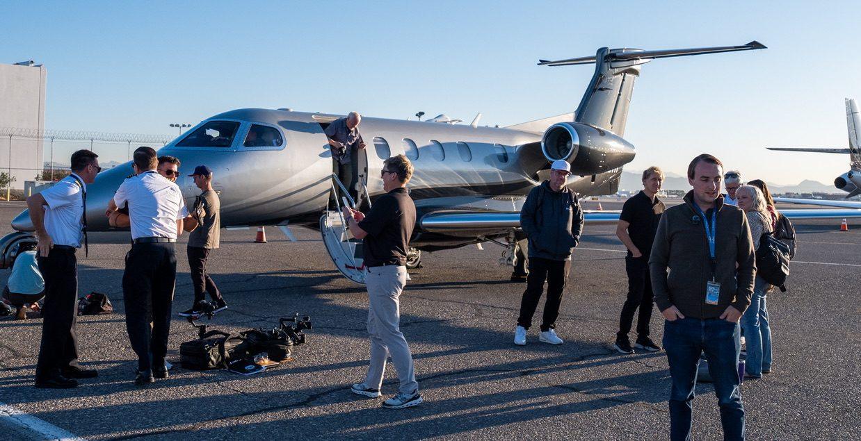 The crew on the ramp with a business jet